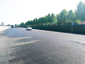 一線丨金晶大道 齊新大道 人民路 改造工程一標段完成東半幅路面瀝青下面層施工